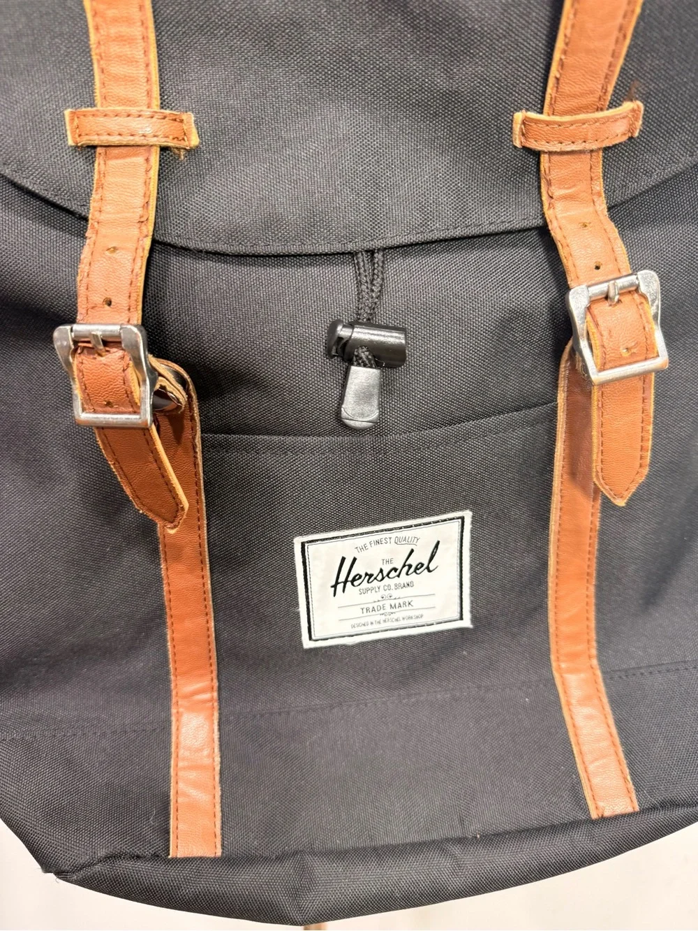 Hershel Retreat Backpack in Black Brown Saddle Canvas with Interior Red Stripe